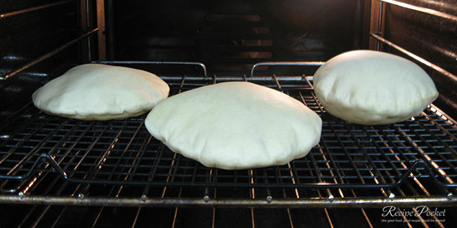 Ptia bread puffed up in oven.