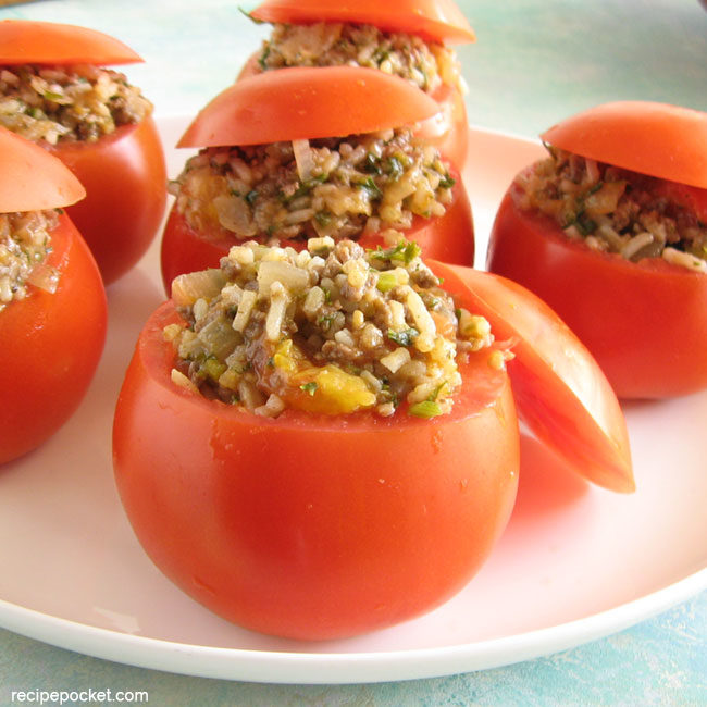 Healthy stuffed tomatoes with mince and rice.