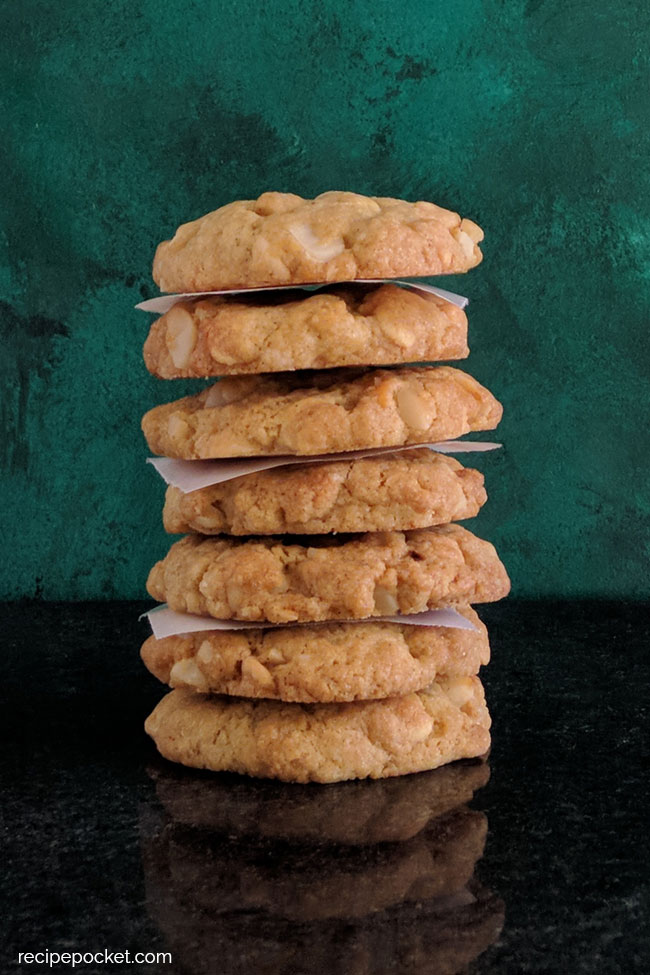 A stack of white chocolate chip macadamia cookies