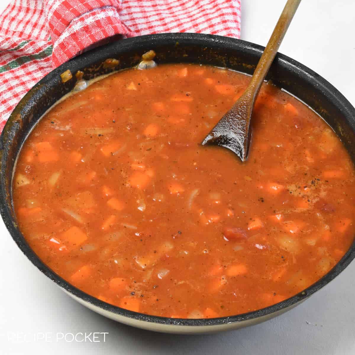 Tomato sauce mixture in a frying pan.