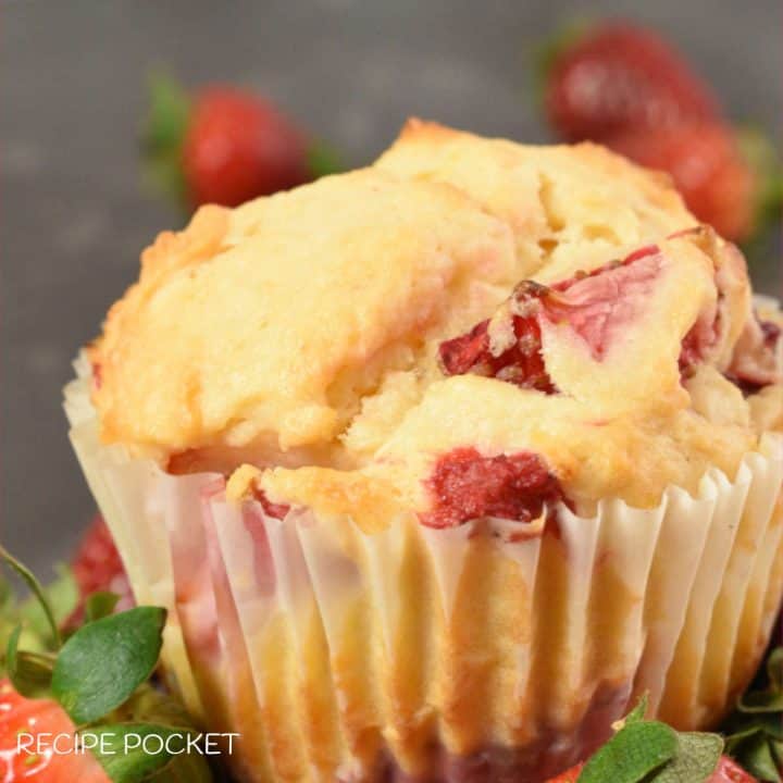 A closeup of a strawberry muffin.
