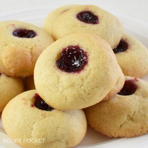 Close up of a cookies with a jam filling.