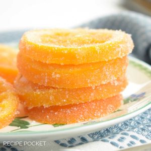 Candied orange slices on a plate.
