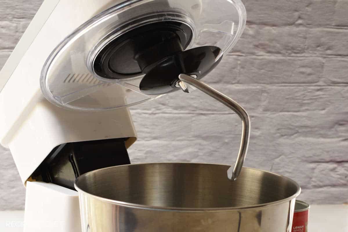 Dough hook attached to stand mixer.