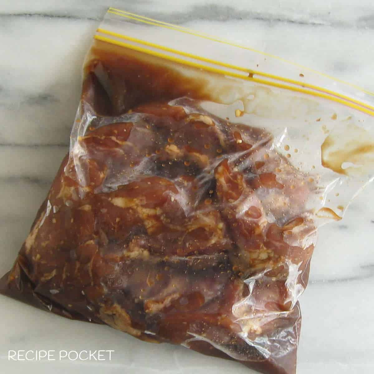 How to make char siu. Pork in marinade in a zip lock bag.