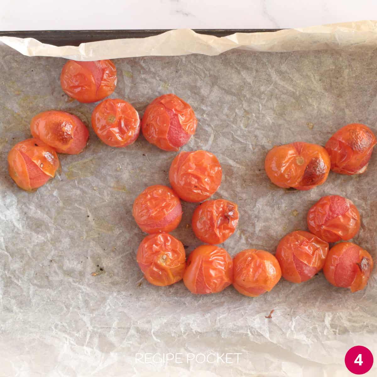 A small tray of roasted cherry tomatoes.